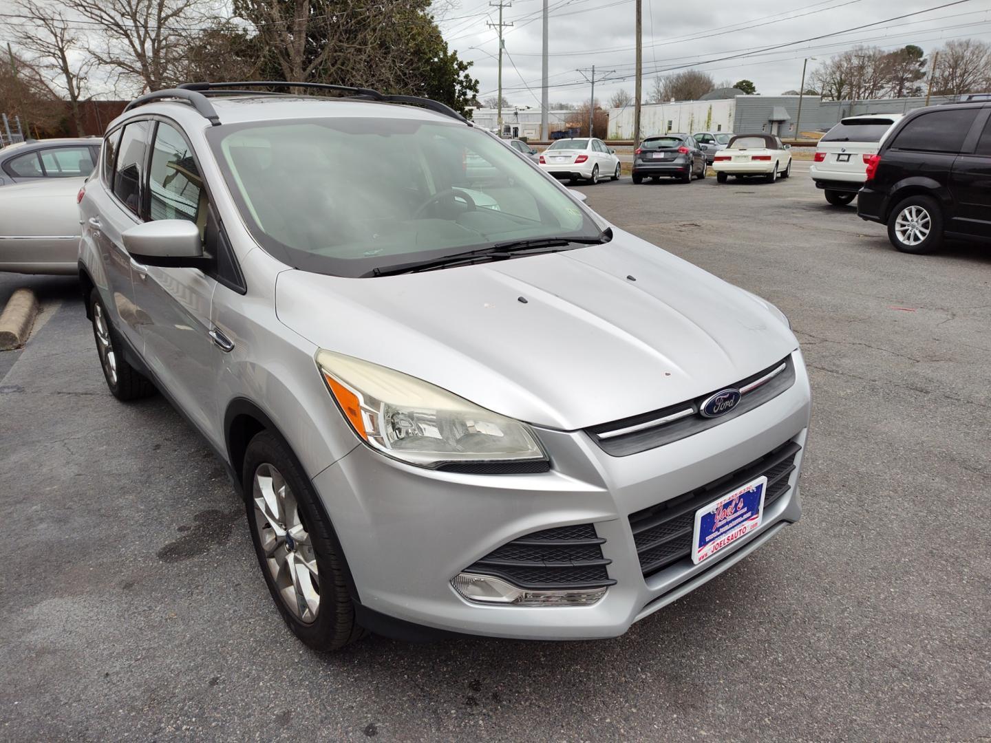 2014 Silver Ford Escape (1FMCU0GX7EU) , Automatic transmission, located at 5700 Curlew Drive, Norfolk, VA, 23502, (757) 455-6330, 36.841885, -76.209412 - Photo#4